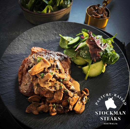 Rump steak with mushroom sauce and a little green salad