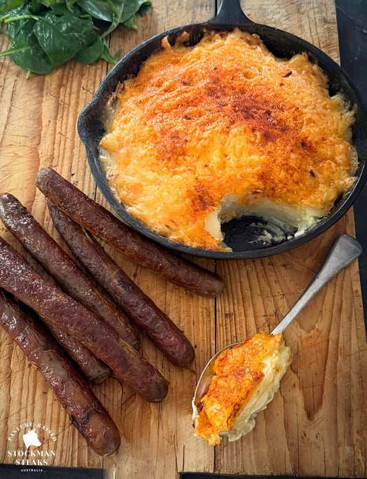 Lamb and rosemary sausages with creamy potato bake